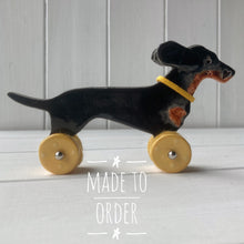 Load image into Gallery viewer, Wind Blown Black & Tan Dachshund "Woof on Wheels"
