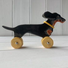 Load image into Gallery viewer, Wind Blown Black & Tan Dachshund "Woof on Wheels"
