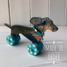 Load image into Gallery viewer, Wind Blown Black & Tan Dachshund "Woof on Wheels"