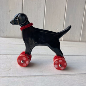 Black Labrador Ceramic "Woof on Wheels" Ornament