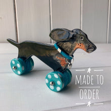 Load image into Gallery viewer, Wind Blown Dachshund "Woof on Wheels"