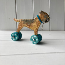 Load image into Gallery viewer, Border Terrier "Woof on Wheels" with sticky up ears