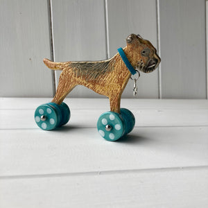 Border Terrier "Woof on Wheels" with sticky up ears