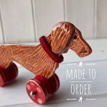 Load image into Gallery viewer, Red Dachshund "Woof on Wheels"