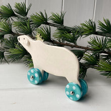 Load image into Gallery viewer, Festive Polar Bear on Wheels