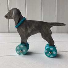 Load image into Gallery viewer, Weimaraner Ceramic "Woof on Wheels" Ornament