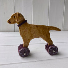 Load image into Gallery viewer, Yellow Labrador Ceramic "Woof on Wheels" Ornament