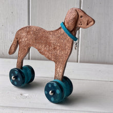 Load image into Gallery viewer, Liver Curly Retriever "Woof on Wheels"