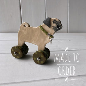 Pug "Woof on Wheels" ceramic ornament