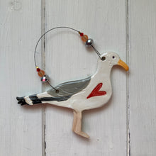Load image into Gallery viewer, a seagull shaped glazed ceramic decoration