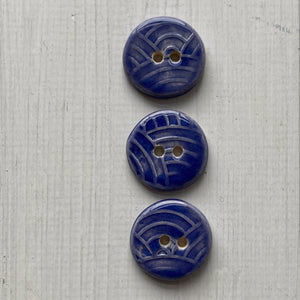 Small wave embossed 22mm button
