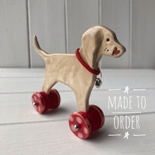 Load image into Gallery viewer, Weimaraner Ceramic "Woof on Wheels" Ornament