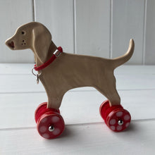 Load image into Gallery viewer, Weimaraner Ceramic "Woof on Wheels" Ornament