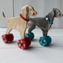 Load image into Gallery viewer, Weimaraner Ceramic "Woof on Wheels" Ornament