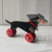 Load image into Gallery viewer, Wind Blown Black & Tan Dachshund "Woof on Wheels"