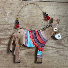 Load image into Gallery viewer, Decorative donkey ornament with a colorful sweater on a wooden surface
