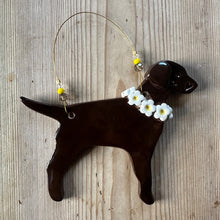 Load image into Gallery viewer, Ceramic Dog decoration on a wooden surface with a flower collar 
