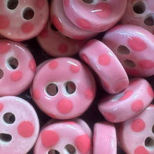 Load image into Gallery viewer, Pink buttons with polka dot design stacked together

