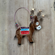 Load image into Gallery viewer, Decorative donkey ornament with beads on a wooden surface

