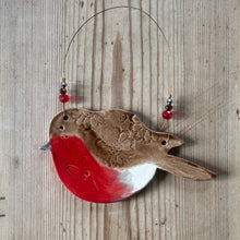 Load image into Gallery viewer, Decorative bird ornament with red breast on a wooden background
