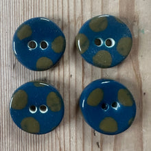 Load image into Gallery viewer, Four teal buttons with olive spots on a wooden surface
