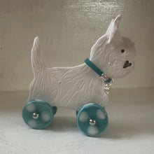 Load image into Gallery viewer, Decorative ceramic white dog design on a plain background
