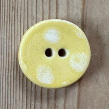 Load image into Gallery viewer, Yellow button with white spots on a wooden surface
