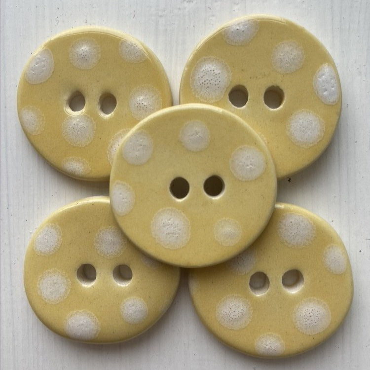 Pale yellow 3cm ceramic buttons with white spots