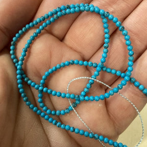 tiny turquoise bead strand