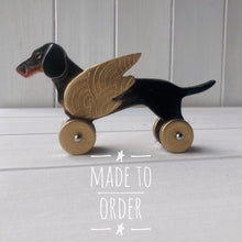 Load image into Gallery viewer, Winged Black &amp; Tan Dachshund &quot;Woof on Wheels&quot;
