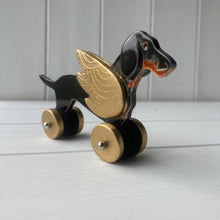 Load image into Gallery viewer, Winged Black &amp; Tan Dachshund &quot;Woof on Wheels&quot;
