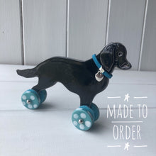 Load image into Gallery viewer, Flat Coated Retriever &quot;Woof on Wheels&quot;, Ceramic Ornament
