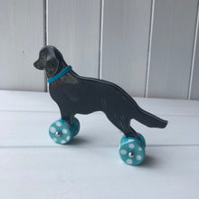 Load image into Gallery viewer, Flat Coated Retriever &quot;Woof on Wheels&quot;, Ceramic Ornament
