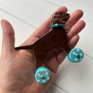 Chocolate Labrador Ceramic "Woof on Wheels" Ornament