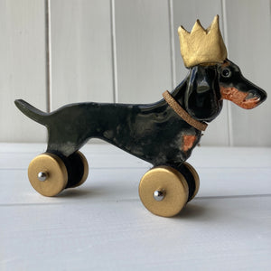 Dachshund in a Party Hat - Woof on Wheels