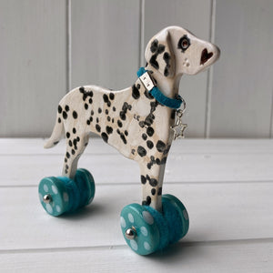 Dalmatian "Woof on Wheels"