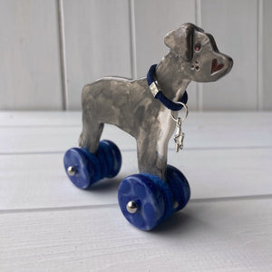 Staffie "Woof on Wheels"