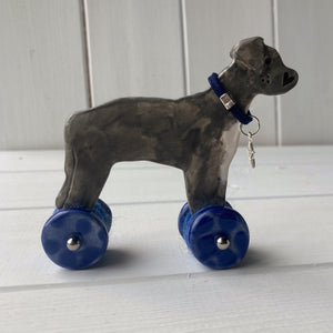 Staffie "Woof on Wheels"