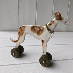 Greyhound Ceramic "Woof on Wheels" Ornament