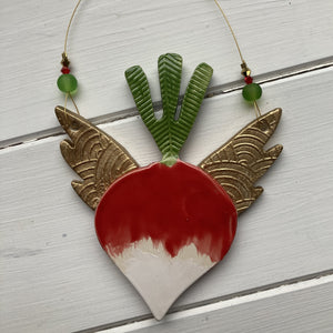 Ceramic radish decoration with wings