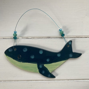 ceramic whale decoration hung on wire with glass and crystal beads