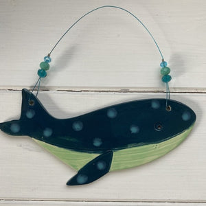 ceramic whale decoration hung on wire with glass and crystal beads