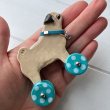 Load image into Gallery viewer, Pug &quot;Woof on Wheels&quot; ceramic ornament
