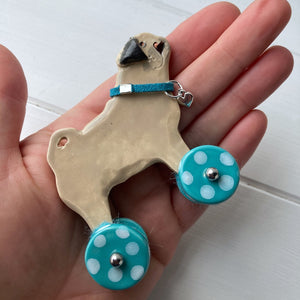 Pug "Woof on Wheels" ceramic ornament