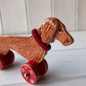 Red Dachshund "Woof on Wheels"