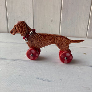 Red Dachshund "Woof on Wheels"