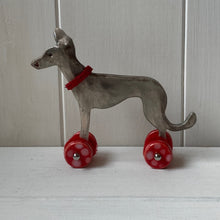 Load image into Gallery viewer, Grey Ceramic &quot;Woof on Wheels&quot; Whippet Decoration
